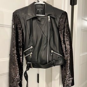 Black leather jacket with sequin sleeves